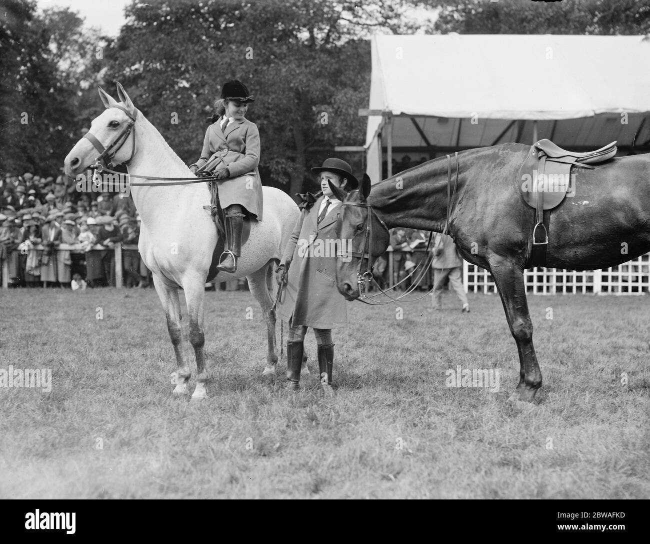 Tring show , 1922 . Miss Patricia ( dismounted ) and Miss Barbara Grant Morden ( daughters of Col Grant Morden ) . Stock Photo