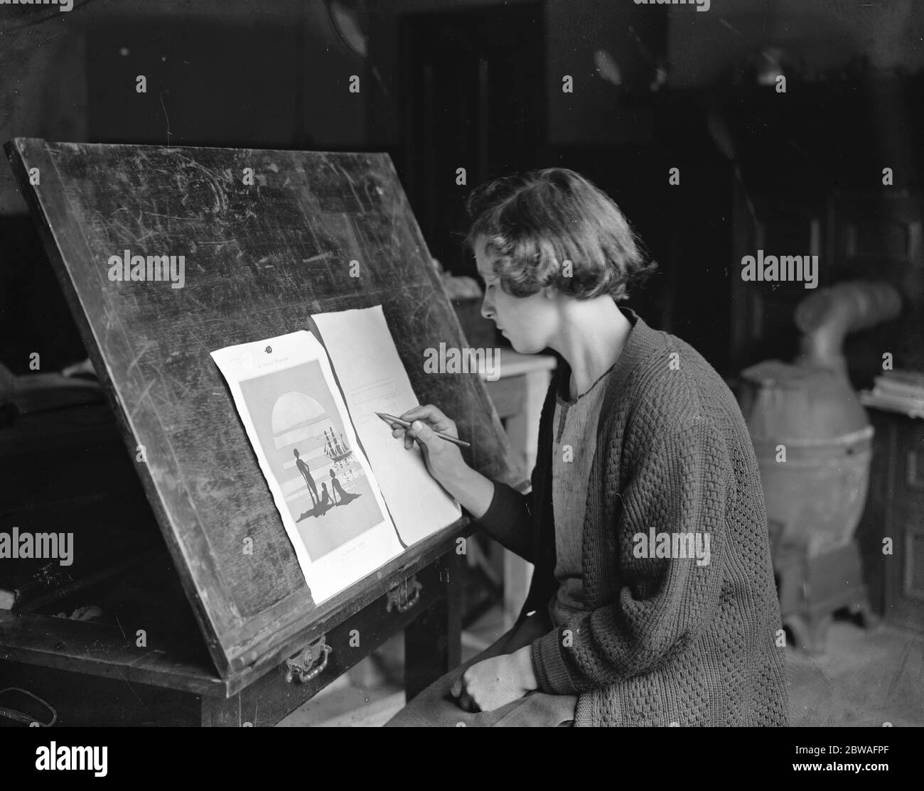The making of decorative stainless steel ornaments by women workers at Birmingham Sketching designs for stainless steel pictures 8 September 1925 Stock Photo