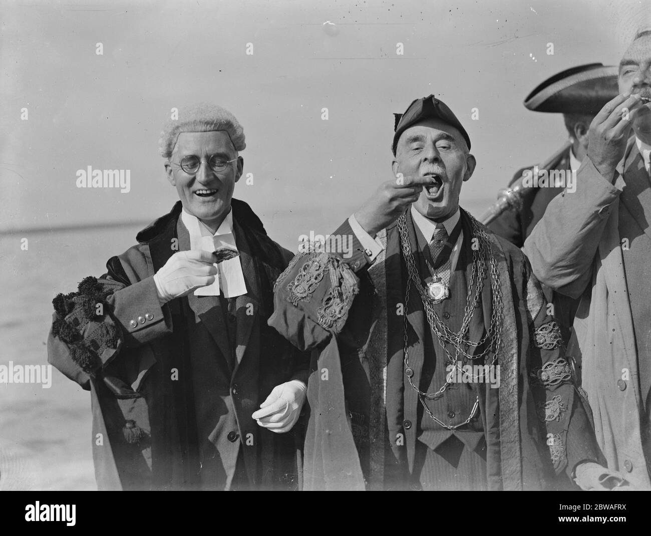 The Colne oyster fishery . Official opening of the oyster fishery at Brightlingsea by the Mayor of Colchester and others , at Brightlingsea . On the left is the Town Clerk of Colchester . 27 September 1934 Stock Photo