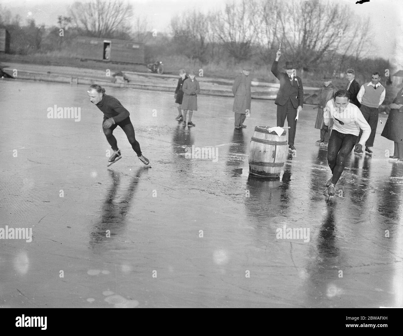 Skating Championships at Bury Lake Rickmansworth Physick , left ( Dark Jersey ) and Wyman 1933 Stock Photo