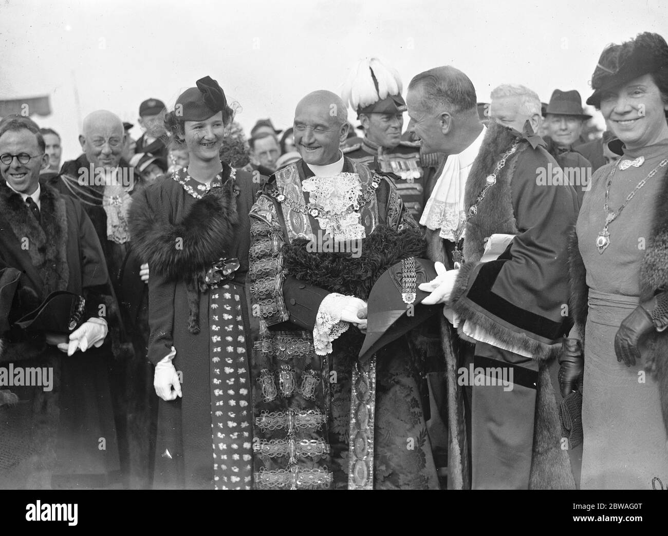 At Romford ' s Charter Day the Lord Mayor of London , Sir George Broadbridge ( left ) , greeting the Charter Mayor , Councillor , CH Allen , JP . Miss Marjorie Bainbridge is seen on the left . 16 September 1937 Stock Photo