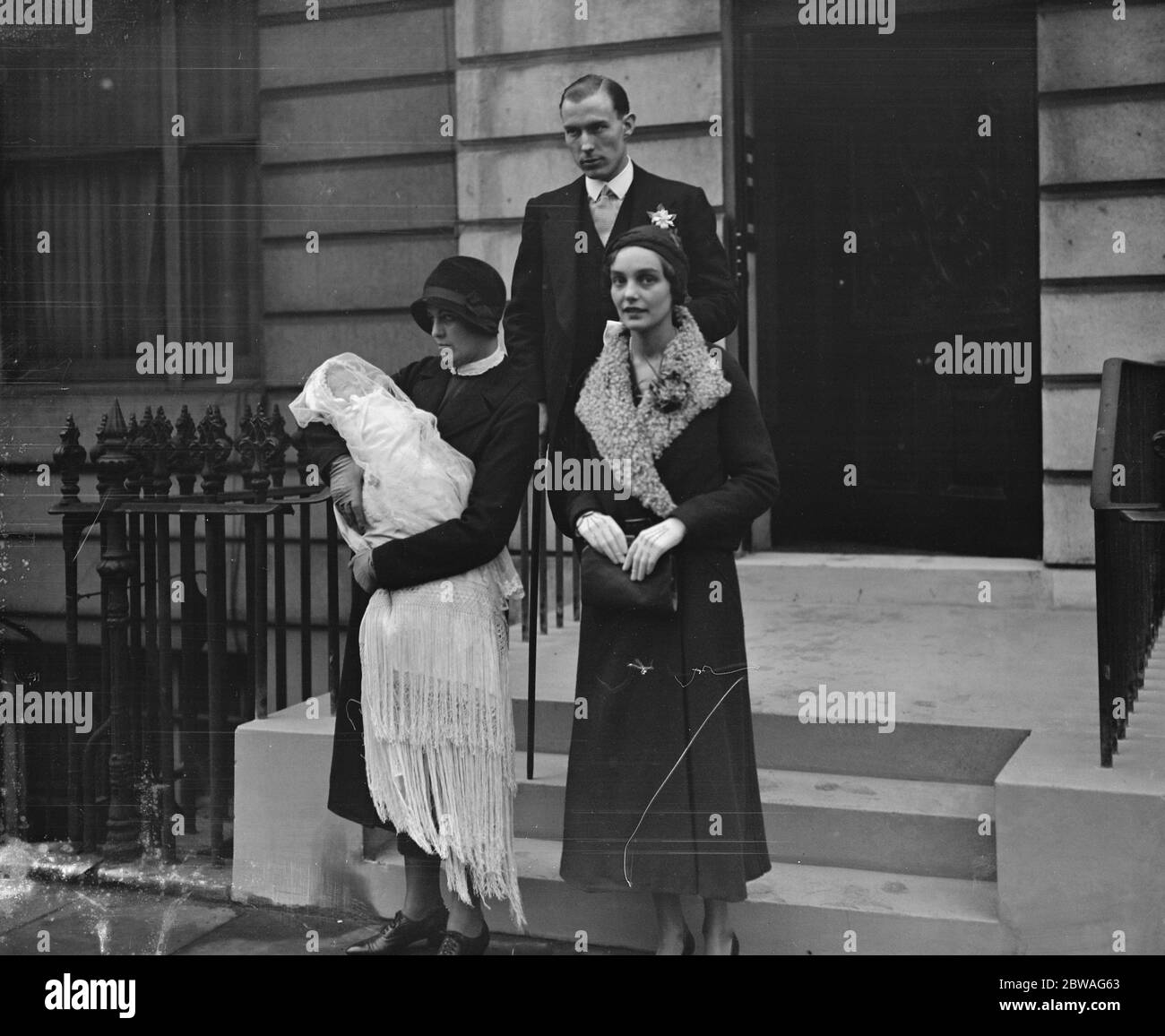 Mr and Mrs Dennis Craig and their infant daughter ( granddaughter of Lord Craigavon ) after christening at St Martin 's - in - the - Field . 16 January 1932 Stock Photo