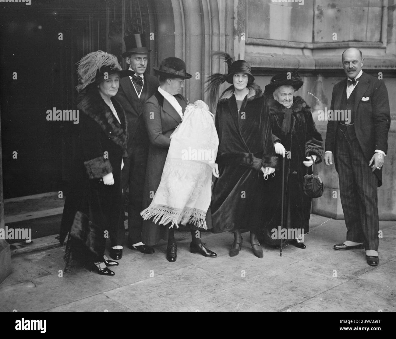 The christening at the crypt of the House of Commons of the infant daughter of Captain J H Thorpe , M P and Mrs Thorpe , with whom are seen Sir John and Lady Norton Griffiths ( Grand Parents ( Grandparents ) and Mrs Wood ( Great Grandmother ) 16 November 1923 Stock Photo