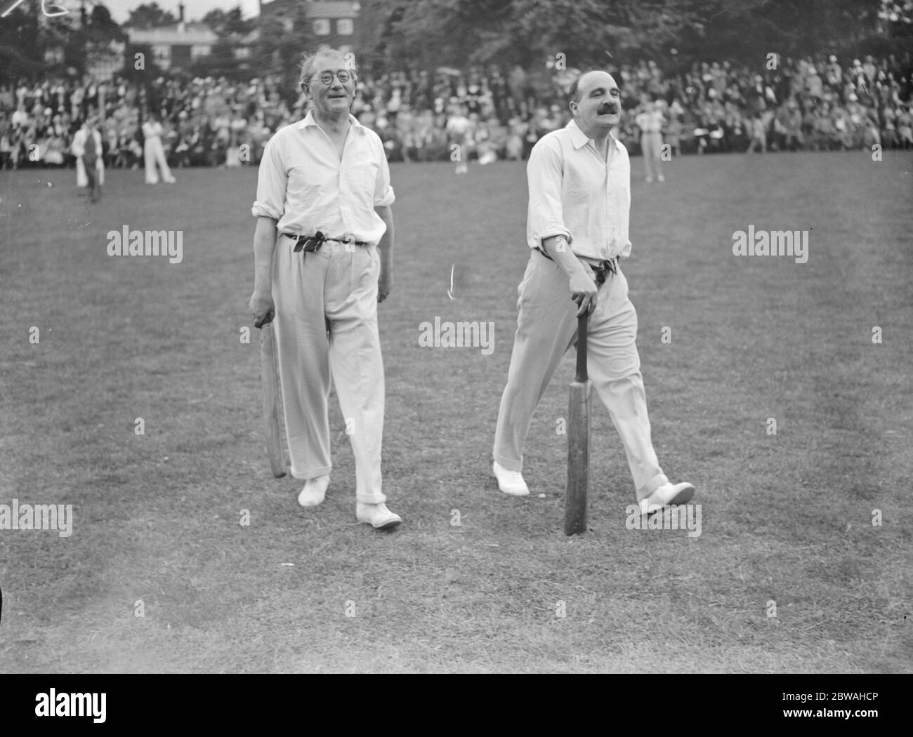 Authors versus actresses cricket at Hampstead Cricket Club Sir J C Squire and Mr Ralph Straus Stock Photo