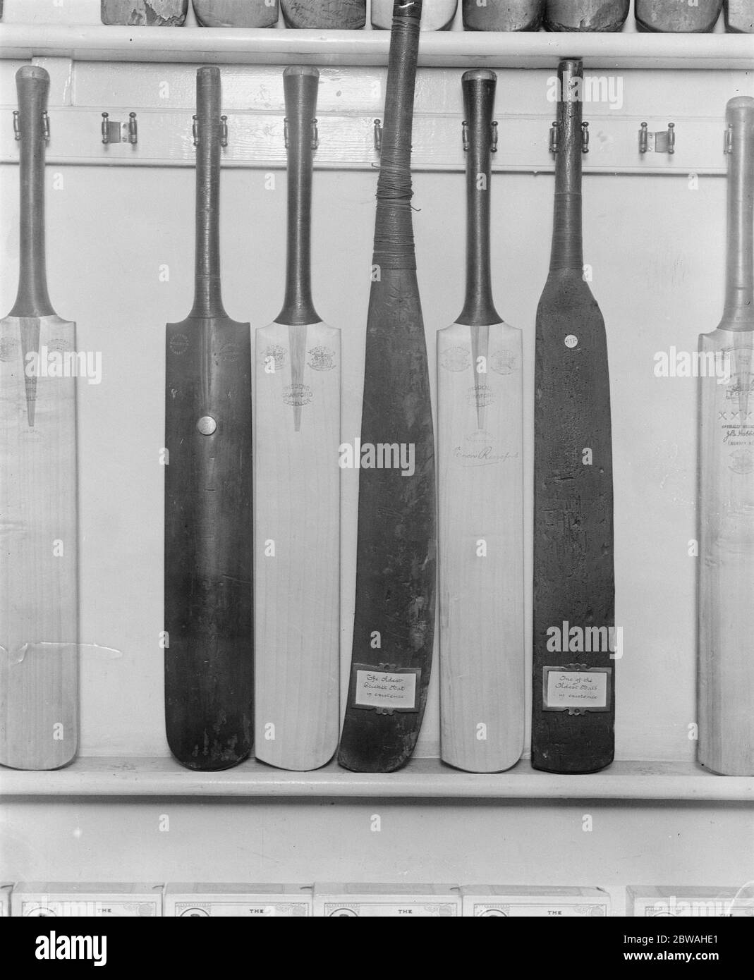 Cricket Bat Making at John Wisden ' s Centre the oldest bat in existence ( 1750 ) , on either side two 1920 bats , left king Edward ' s bat another old bat is seen on the right 23 March 1920 Stock Photo