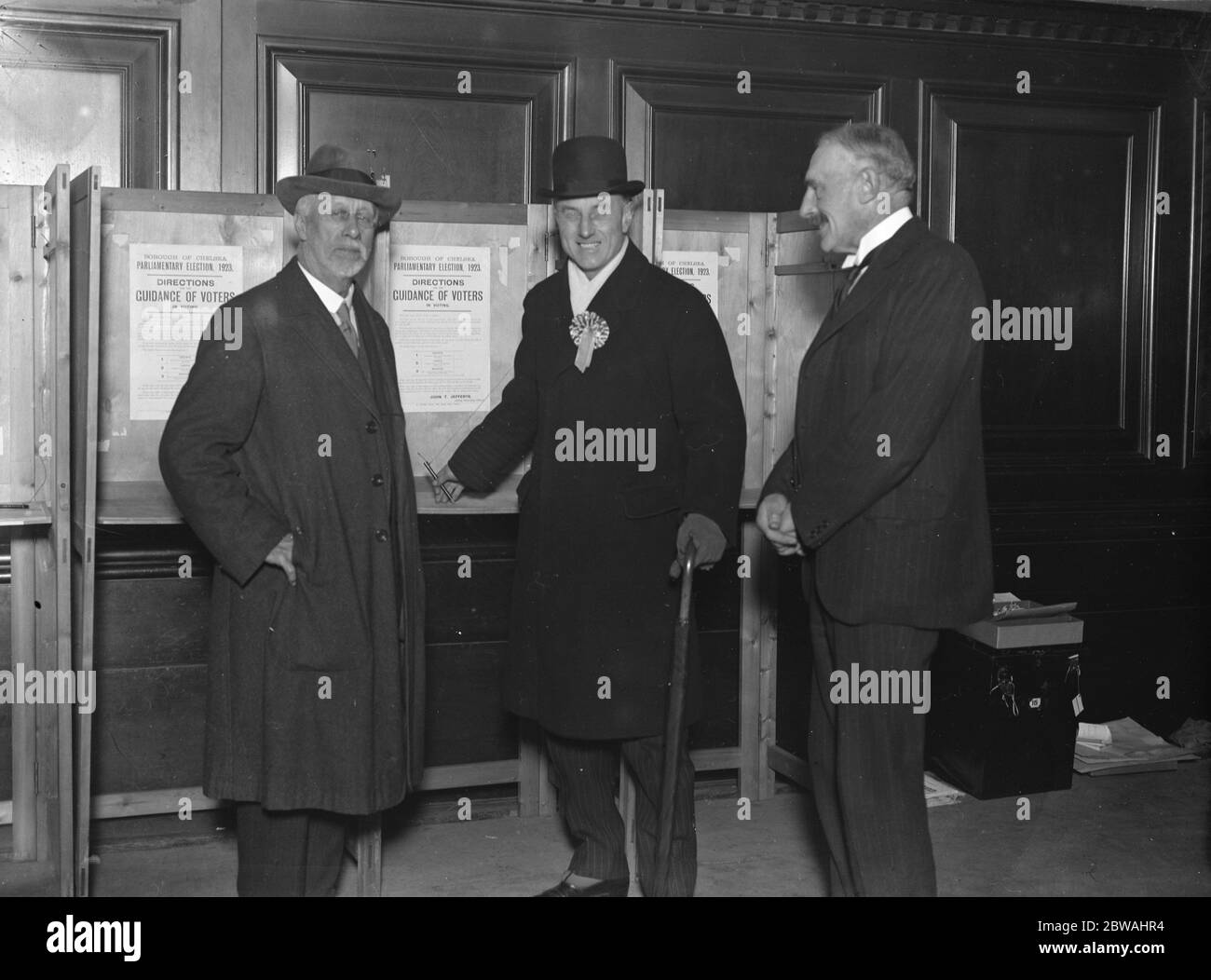 Election scenes . Sir Samuel Hoare polling his vote at Chelsea Stock Photo