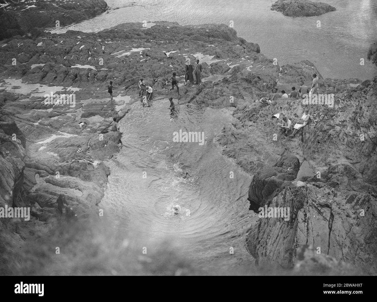 Swimming lake in a rock pool on the coast - no further information available c.1920s Stock Photo