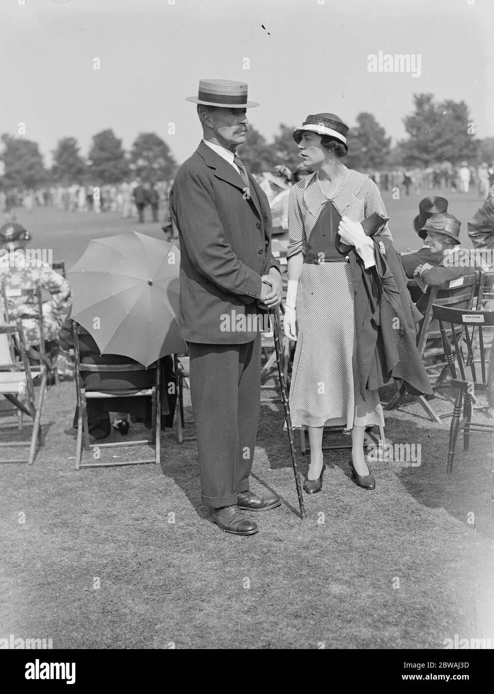Eton versus Winchester Sir F Hervey Bathurst and Miss Pamela Keys 30 June 1933 Stock Photo