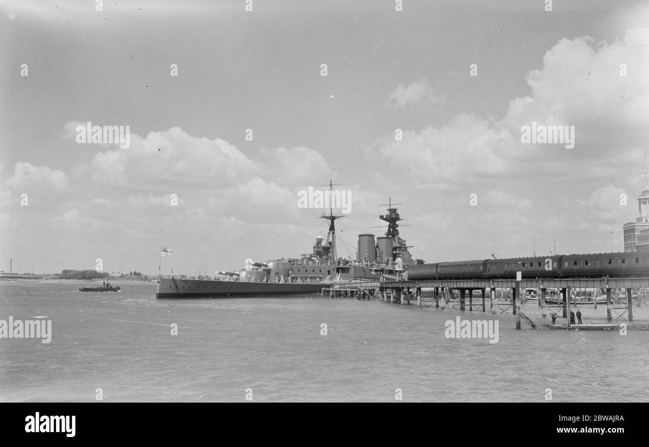 HMS Hood in Portsmouth harbour , prior to entering the dry docks for overhaul 17 June 1933 Stock Photo