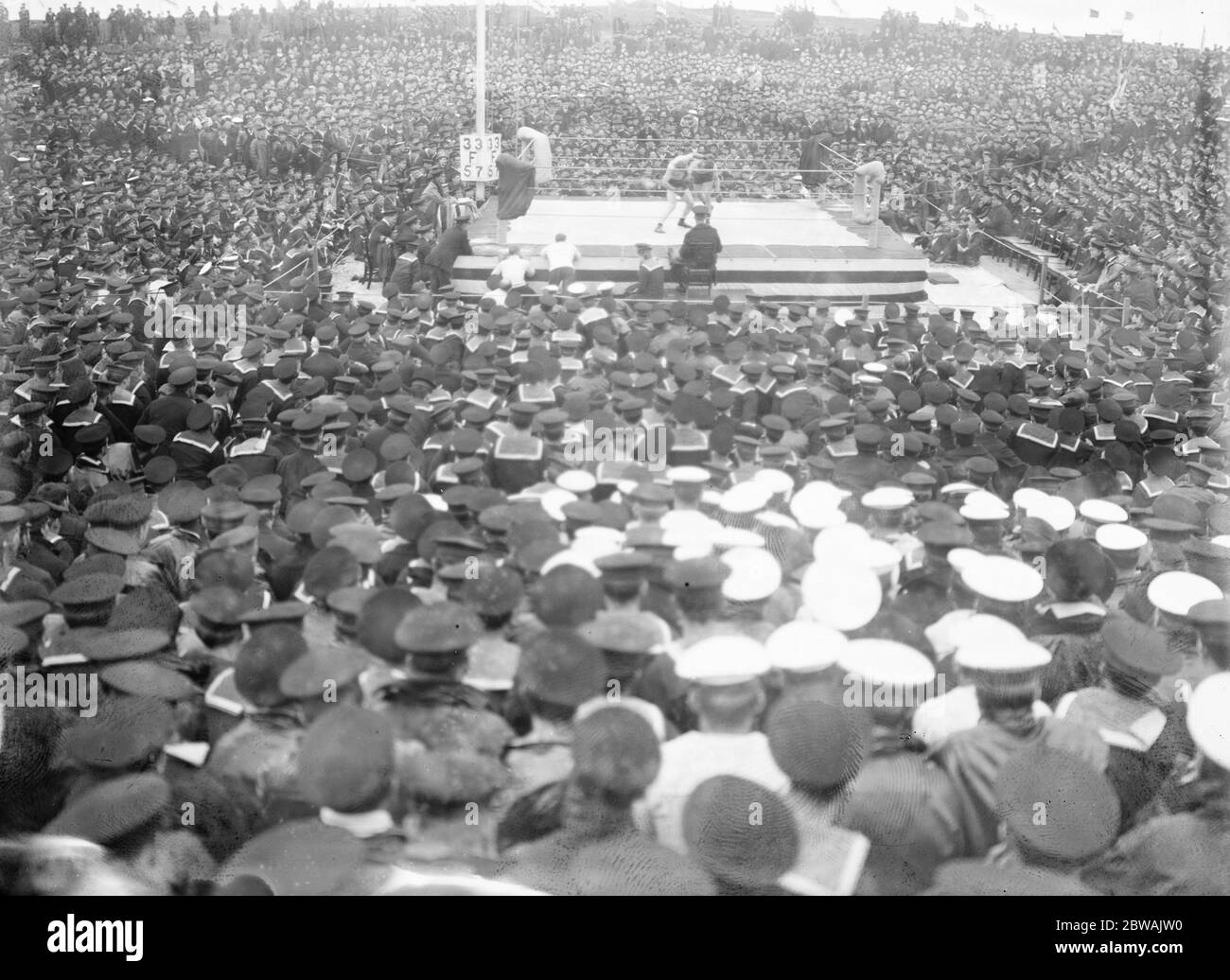 1916 Finals of the Grand Fleet boxing competitions held on the island of Flotta, by Scapa Flow, where the Grand Fleet was then stationed. The boxing ring was jury-built from spars, ropes, canvas and planking scavenged from various ships by a couple of enterprising Chief Petty Officers, names now not known. Stock Photo