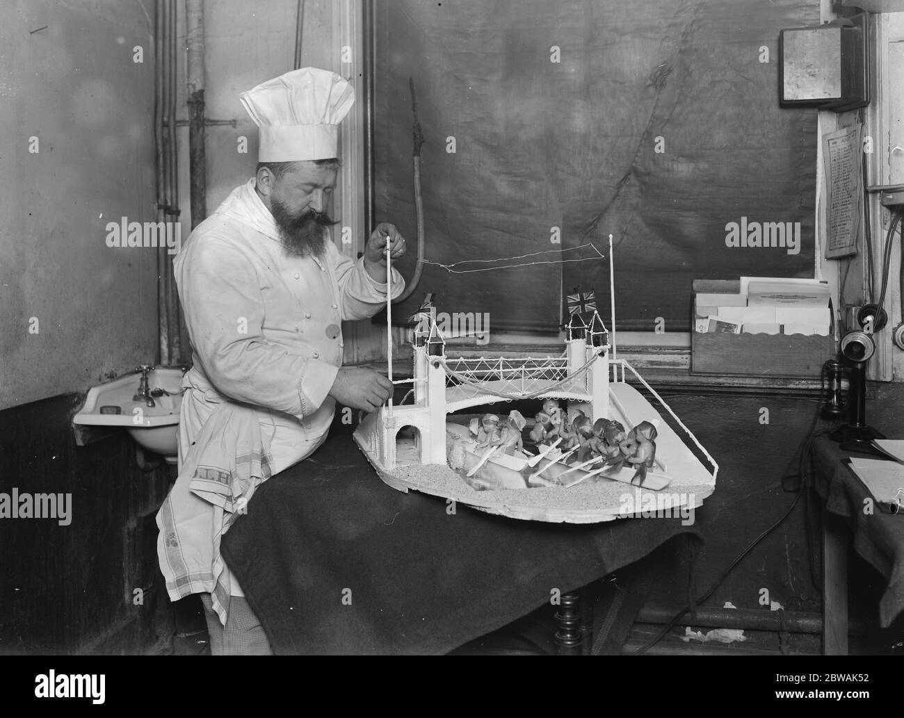 Mr Cantelupe , The Criterion chef , At work on his model of the boat race 23 March 1923 Stock Photo