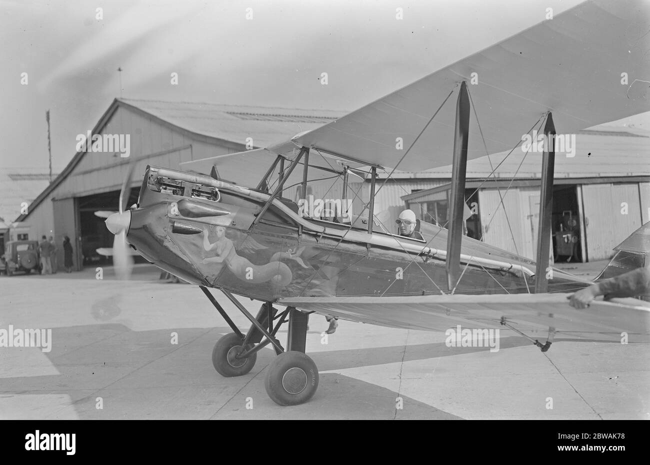 Guild of air pilots and navigators display at Brooklands Hon Mrs E Montagu and her pilot , Mr Belville 7 June 1933 Stock Photo