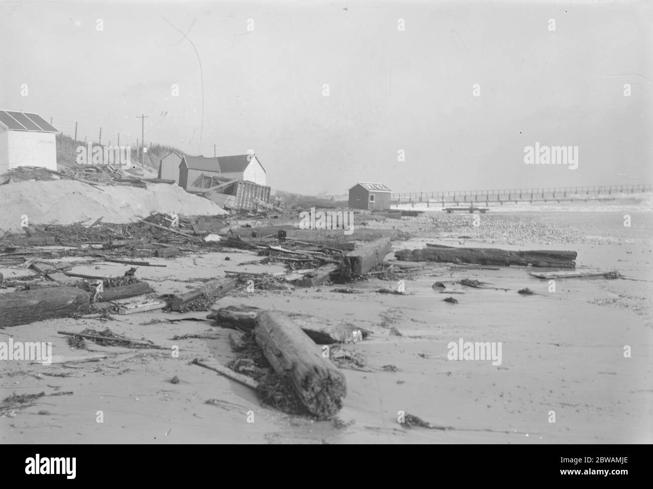 The wreckage of bathing huts at Littlehampton after the Great Storm . 1925 Stock Photo