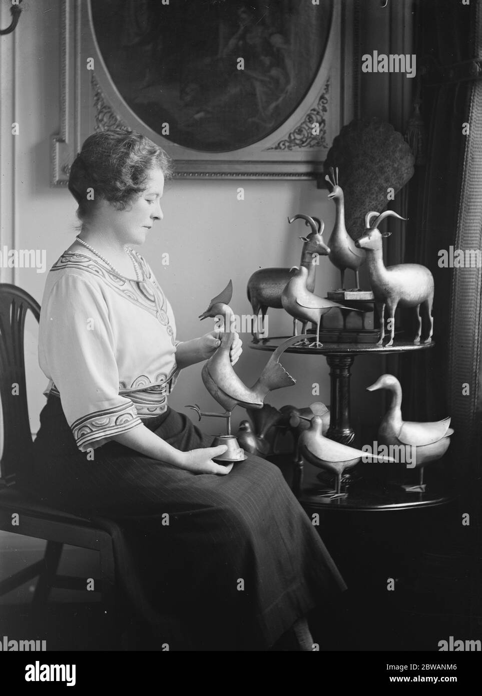 Mrs Herbert Da Costa and her collection of sacred persian birds Stock Photo