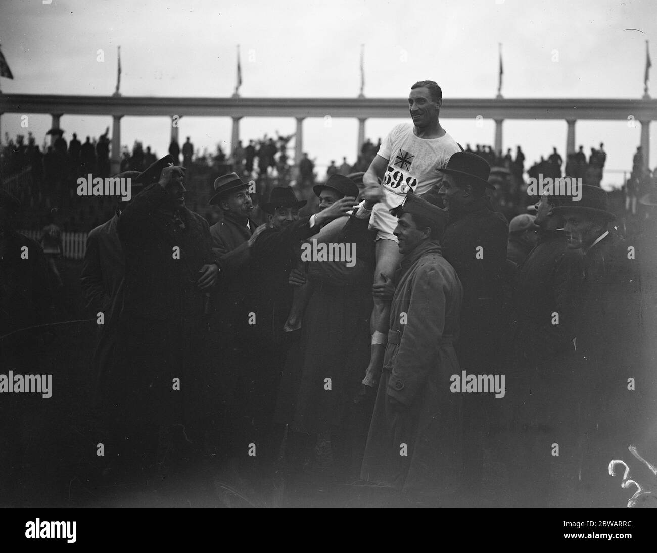 Olympic Games at Antwerp Chairing Albert Hill of Great Britain after he had won the final of the 1500 metres race 20 August 1920 Stock Photo