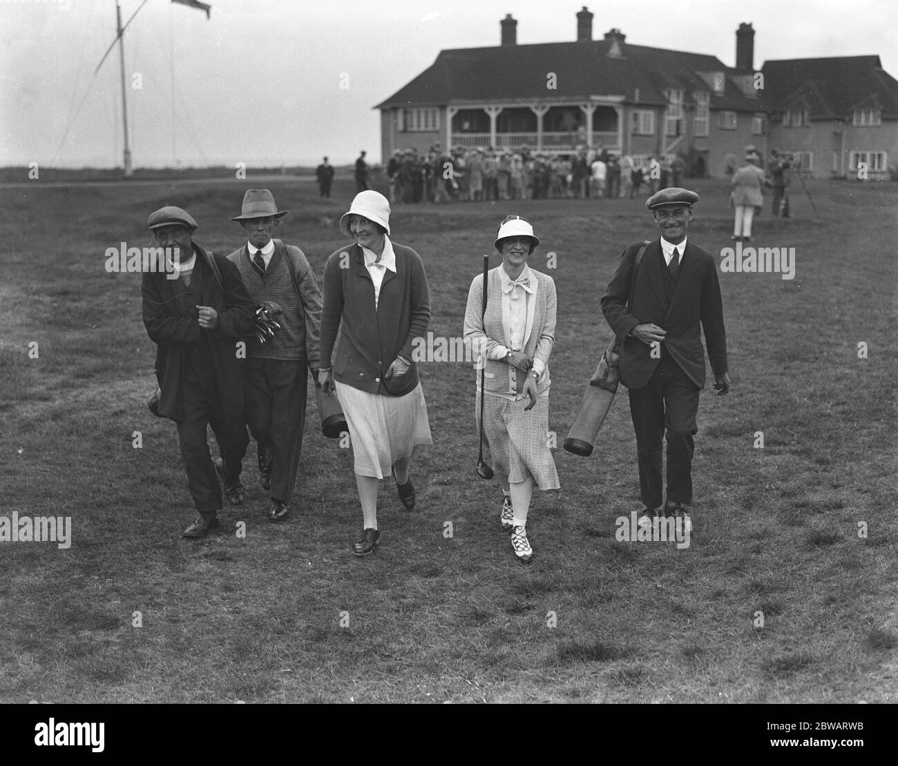 The Society Ladies versus Artisans golf match at Sandwich Golf Club , Kent . Lady Astor , ( right ) who was partnered by Mrs Leslie against E H Clark , ( Steward ) and F Watson ( Jazz Jumper ) and A Gardner 1930 Stock Photo