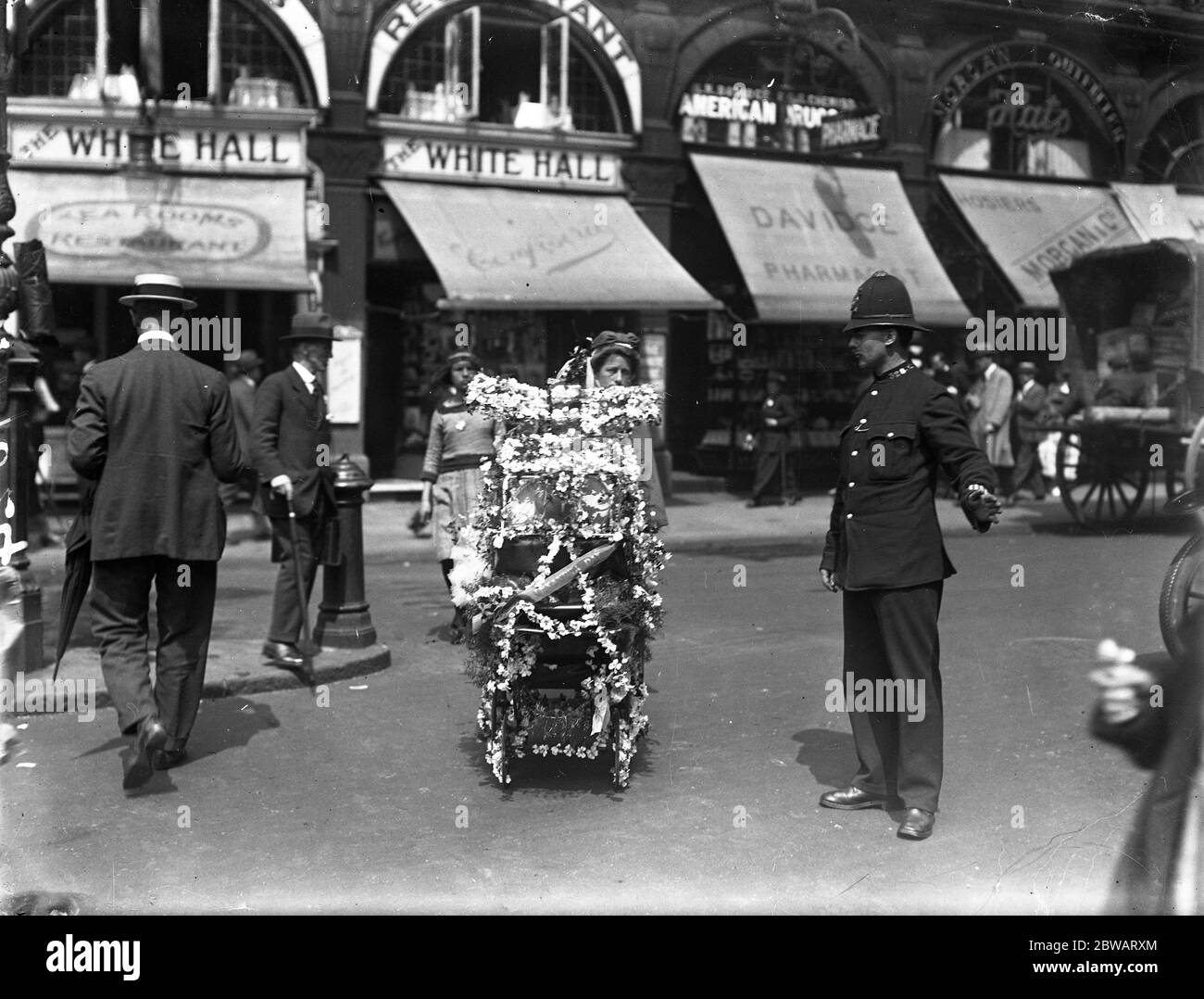 Celebrating Alexandra Rose Day The decorated bassinnette ( pram ) . 24 June 1920 Stock Photo