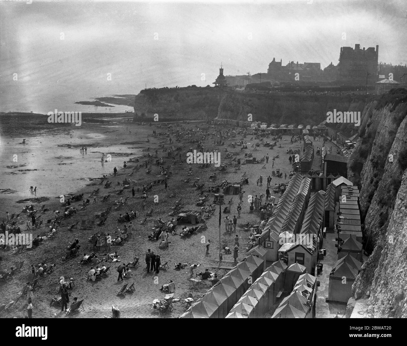 The beach at Broadstairs , full of holidaymakers . 31 August 1930 Stock Photo