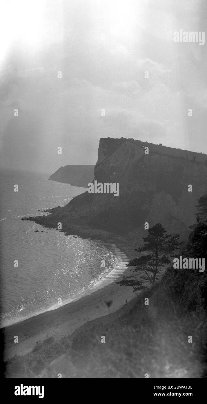 A view overlooking the beach and cliffs of Beer Head , Devon . 1 September 1932 Stock Photo