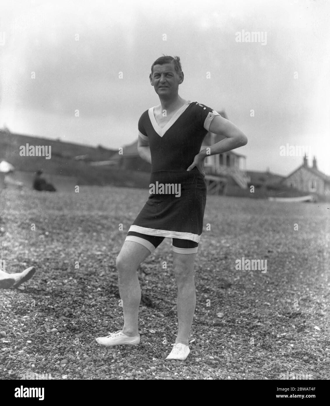 The standard American bathing suit for men . 18 May 1921 Stock Photo