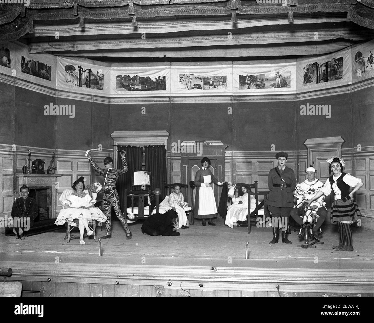 Convalescent soldiers in pantomime at Eastbourne . Officers , NCOs and men of Summerdown Convalescent Hospital , Eastbourne , are appearing in a pantomime . The entire production , from music to scenery , is the work of the officers and men . 9 January 1918 Stock Photo