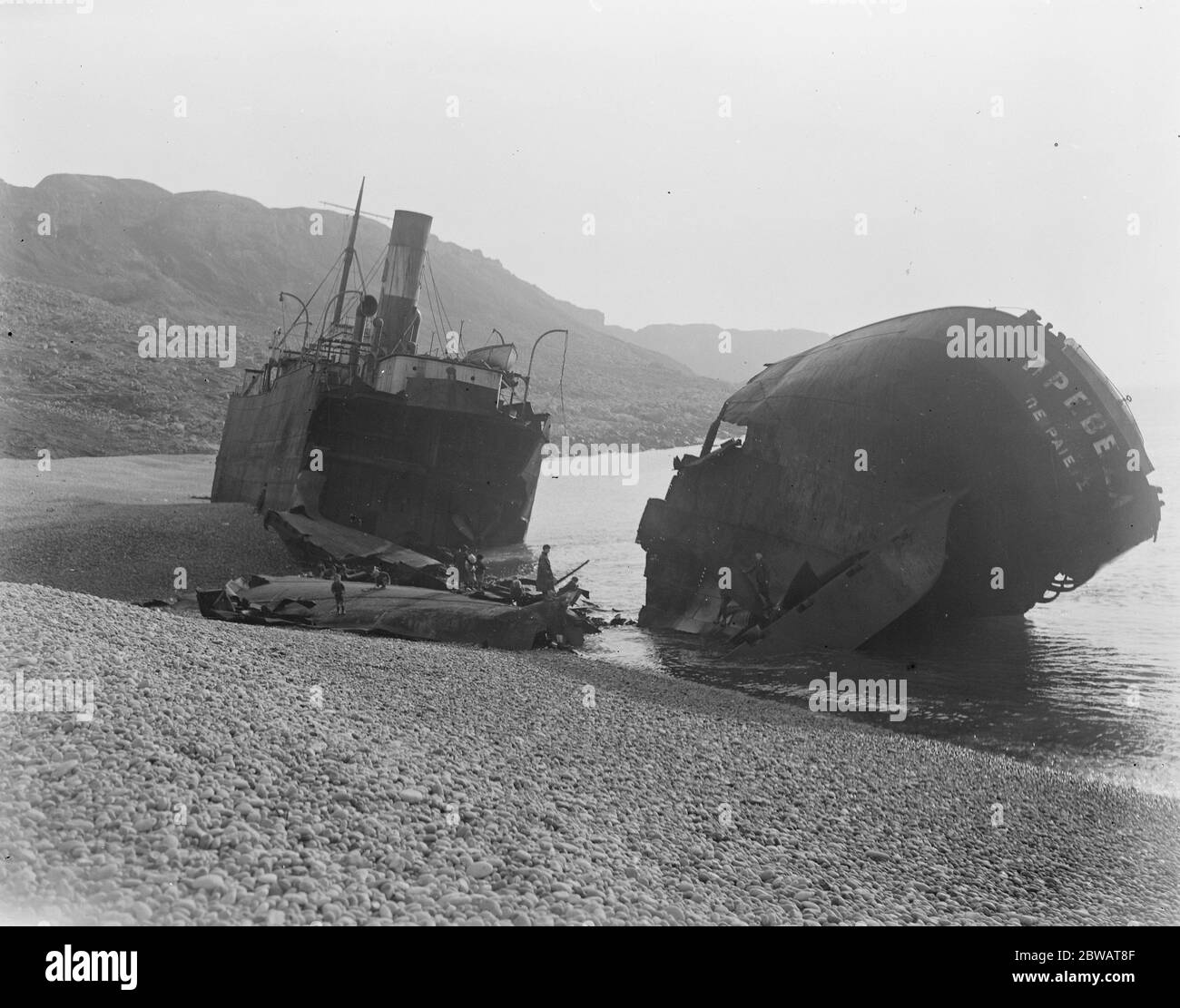 Singular South Coast Wreck The Greek Merchant Steamer ' Preveza ' The vessel lies high on the beach and the plates connecting the bow and stern have collapsed 26 February 1920 Stock Photo