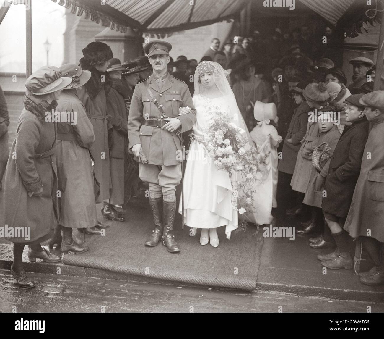 V C Weds An interesting wedding took place at St Barnabas ' Church ' Dulwich Village , on Saturday , when Miss Winifred Frankland daughter of Mr and Mrs Edward Frankland , of Llanberis was married to Major A C Herring ( Victoria Cross ) Bride and Bridegroom after the ceremony 4 February 1922 Stock Photo