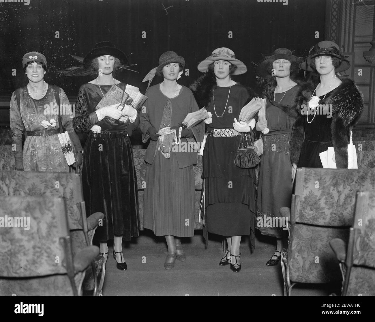 Society sellers of programmes and choclates Voluntees Harcourt and Lady Crosfield had arranged for an attractive set of ' sellers ' at the Winter Garden Theatre Matinee in aid of the League of Nations Union on Tuesday ' The programme sellers , left to right Mrs Claude Beddington , the Hon Mrs Roland Cubitt , Lady Sinclair , Hon O Harcourt , Miss Chaplin and the Hon Doris Harcourt 21 February 1922 Stock Photo