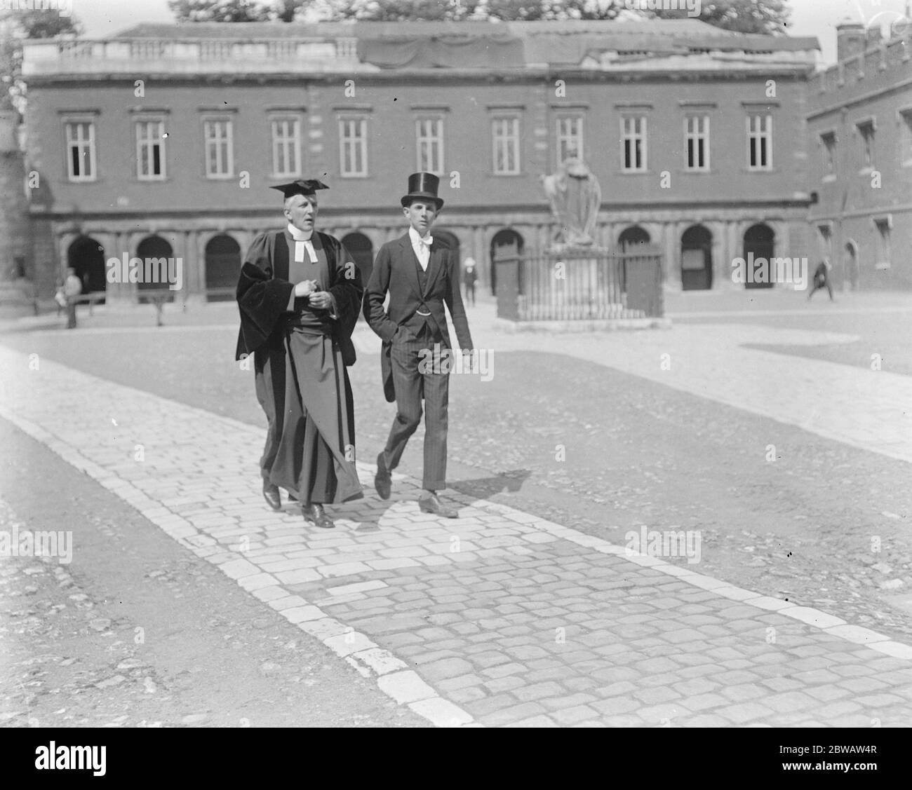 The fourth of June celebrations at Eton . Dr Alington , the head master walking in the grounds of the College with one of the 6th form boys . 3 June 1922 Stock Photo