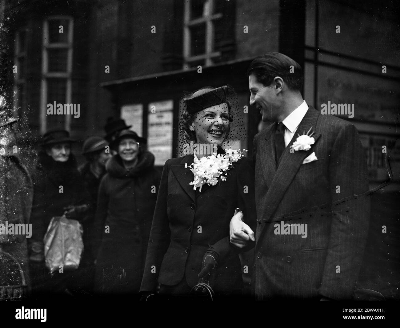 The wedding of Mr Ian Wilson - Young ( second secretary at the Foreign Office ) and Mrs Charlotte Nast at Caxton Hall Register Office , London . 21 February 1940 Stock Photo