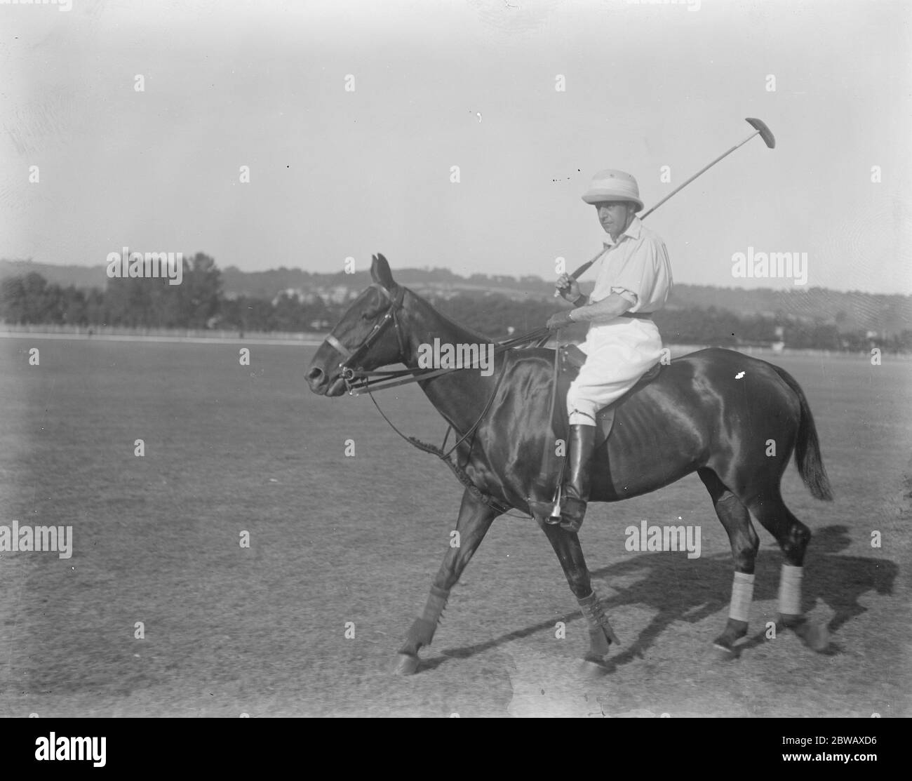 Well known Society people at Deauville . Baron de Rothschild ready for a game of polo . 8 August 1921 Stock Photo