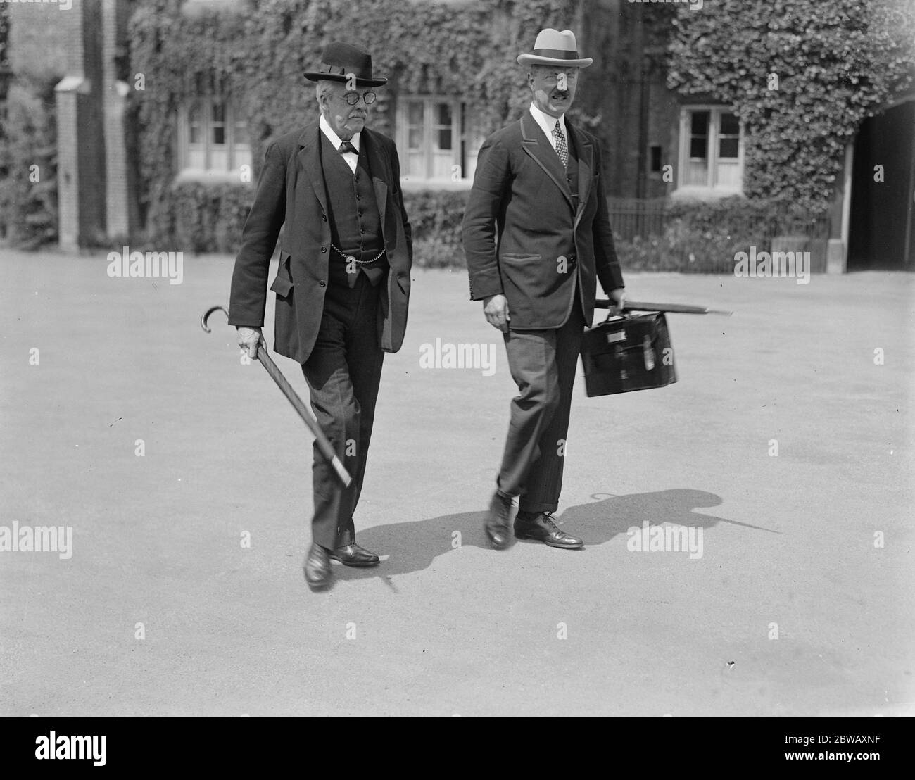 League of Nations sits in London Earl of Balfour leaving St James Palace this morning sitting of the council . he is seen wearing a pair of horn rimmed glasses 19 July 1922 Stock Photo
