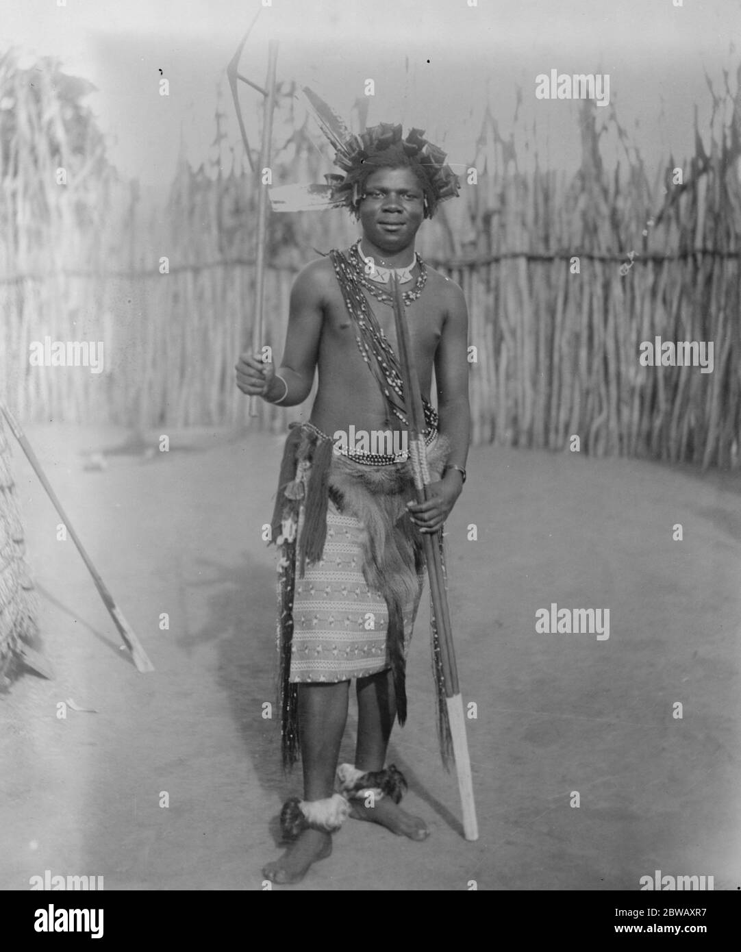 King Sobhusa coming to London Paramount Chief of the Swazi Nation King Sobhusa in native dress . He is carrying a battle axe in curious design 3 January 1923 Stock Photo