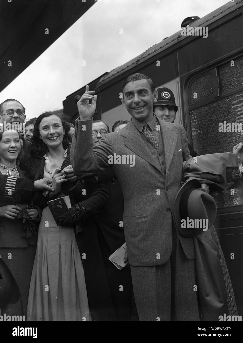 Mr Eddie Cantor , the American entertainer , on his arrival at Waterloo Station , London . 11 July 1938 Stock Photo