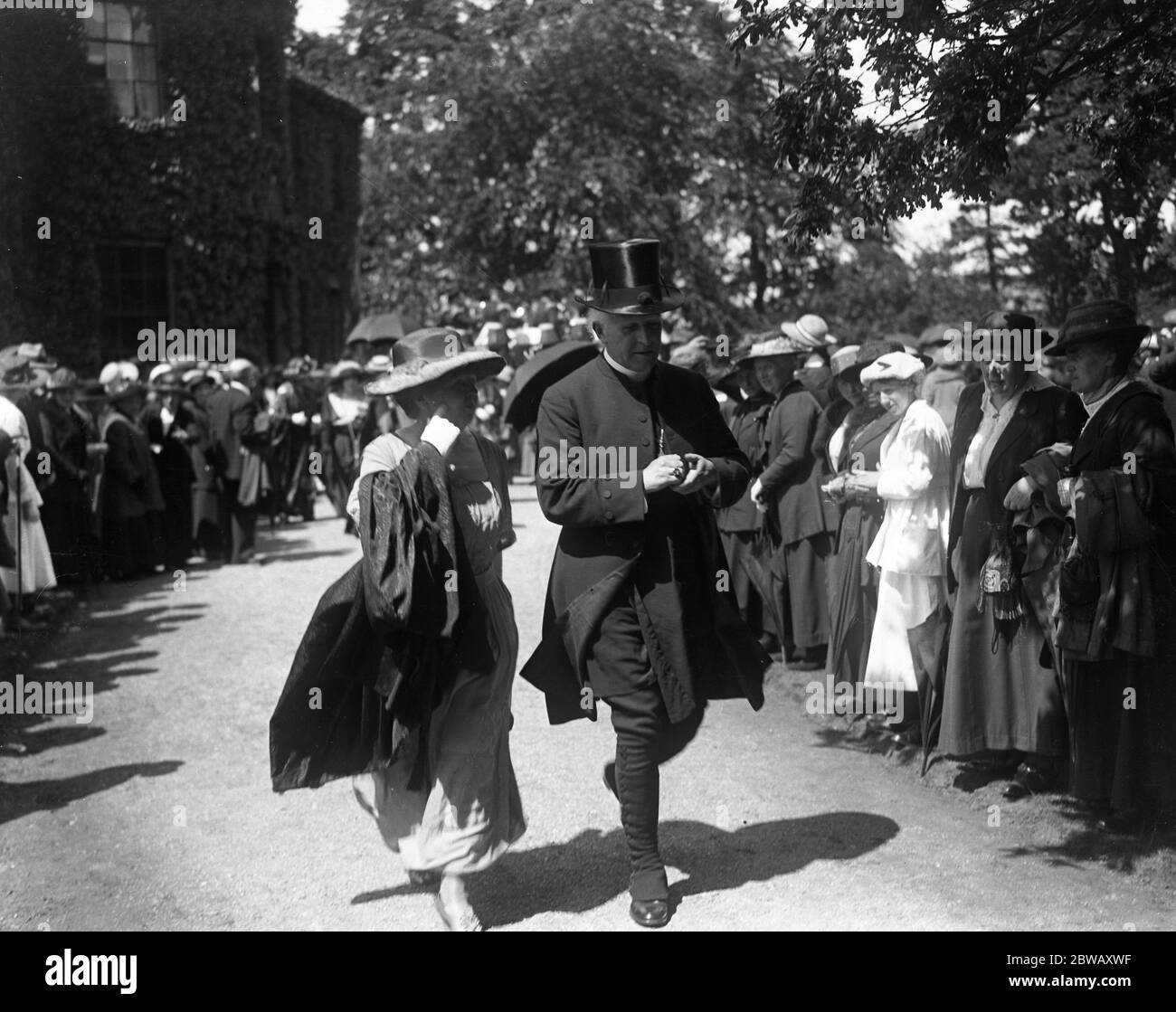 At St Asaph Cathedral , Wales for the enthronement of the first Archbishop of Wales . Mrs Lloyd George walks with the Archbishop of York . 1 June 1920 Stock Photo