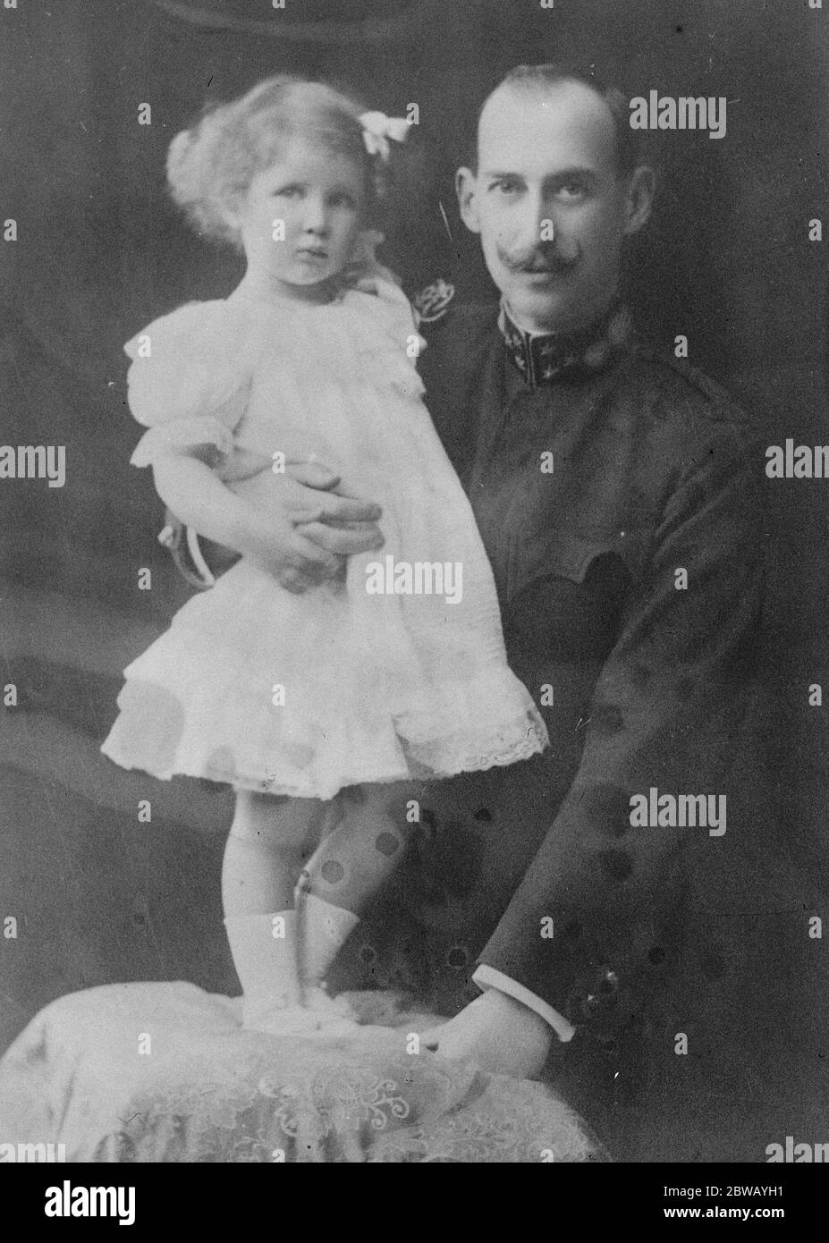 Prince Nicholas of Greece , brother of Prince Andrew who is leaving Greece with his family to settle in Switzerland 7 December 1922 Prince Nicholas of Greece and Denmark ( 22 January 1872 - 8 February 1938 ) The child in this photograph looks very much like Princess Olga as a toddler / very young girl - it is likely that this photograph was actually taken in the early 1900s - and the appearance of Prince Nicholas in this photograph matches other photographs of him taken in eg 1902. Stock Photo