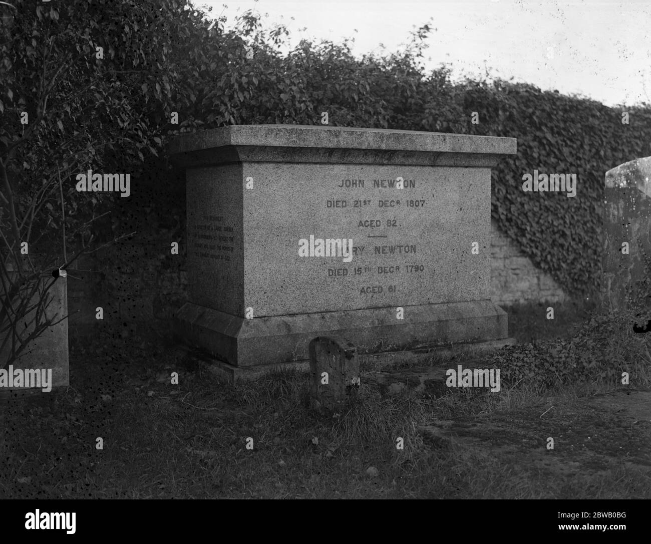 In the graveyard at Olney Parish Church , Hampshire , the tombstone of the famous hymn writer John Newton . 1926 Stock Photo