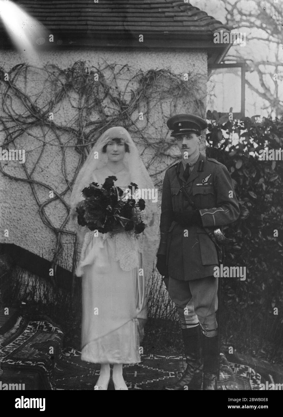 Miss Beatrice Ms Johnstone , daughter of Mr A Johnstone District Inspector General of police of Bengal and Lieut Desmond P Fitzgerald Uniacke Royal Irish Rifles of Upminster at Wadhurst Parish Church in East Sussex, England 19 March 1920 Stock Photo