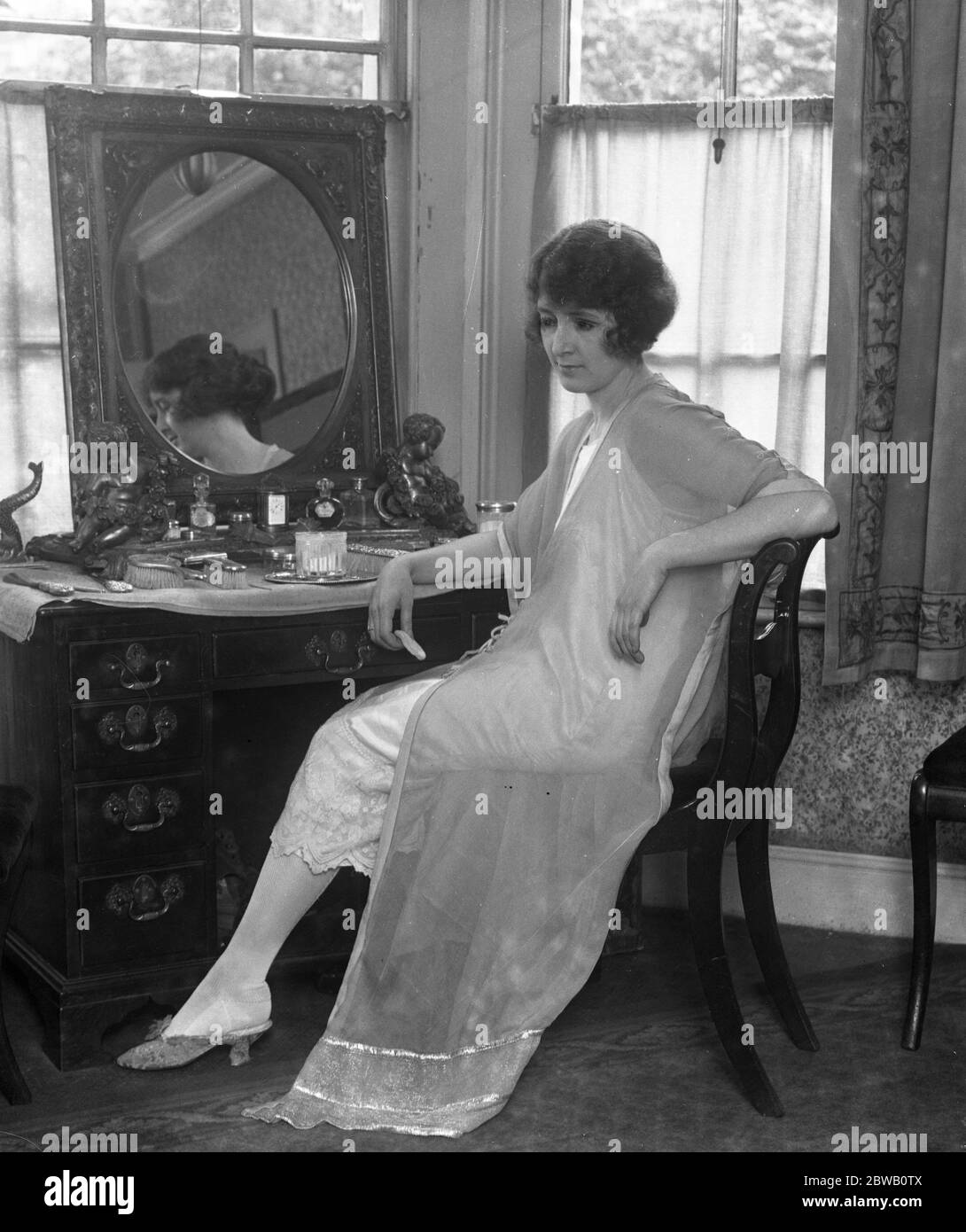 English actress , Miss Marjorie Hume at her dressing table . Stock Photo