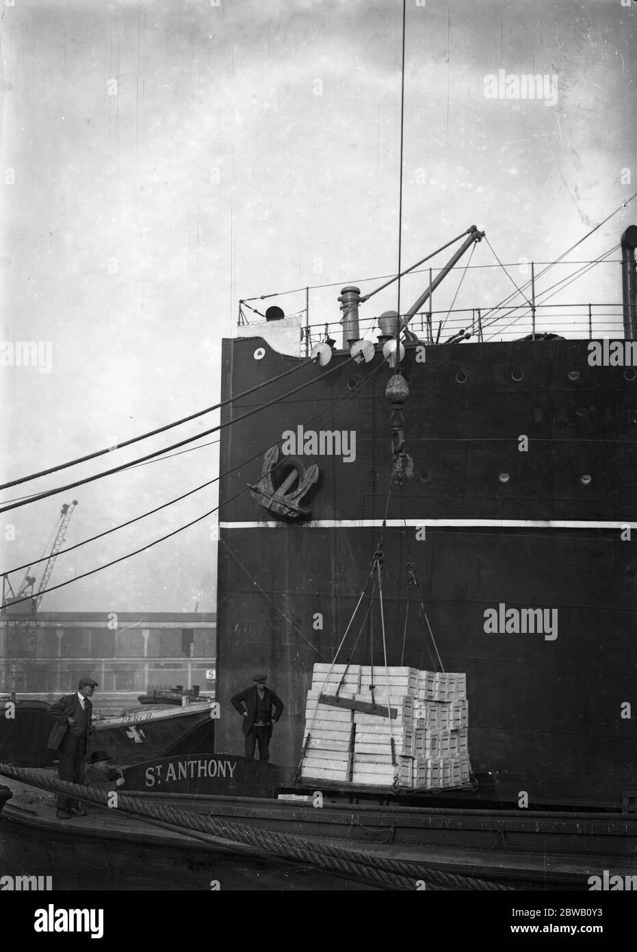 Unloading a cargo of 7,000,000 Australian eggs from the liner , ' Barradine ' at the King George V dock , London . They have been brought over in refrigerator space from Sydney , Freemantle , Brisbane , Melbourne and Adelaide in Australia . 5 November 1931 Stock Photo