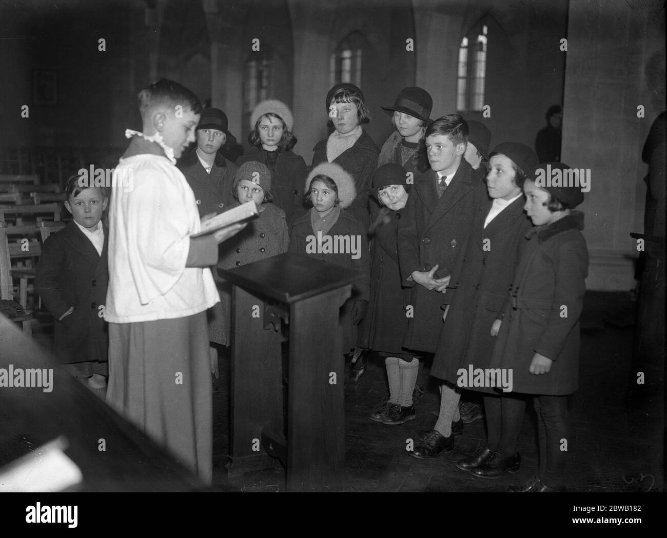 Once a month a children ' s service is conducted by the small worshippers themselves . It is held at St Paul ' s Church , Egham Hythe , Surrey . The vicar and sidesmen being elected by themselves . 1 March 1936 Stock Photo