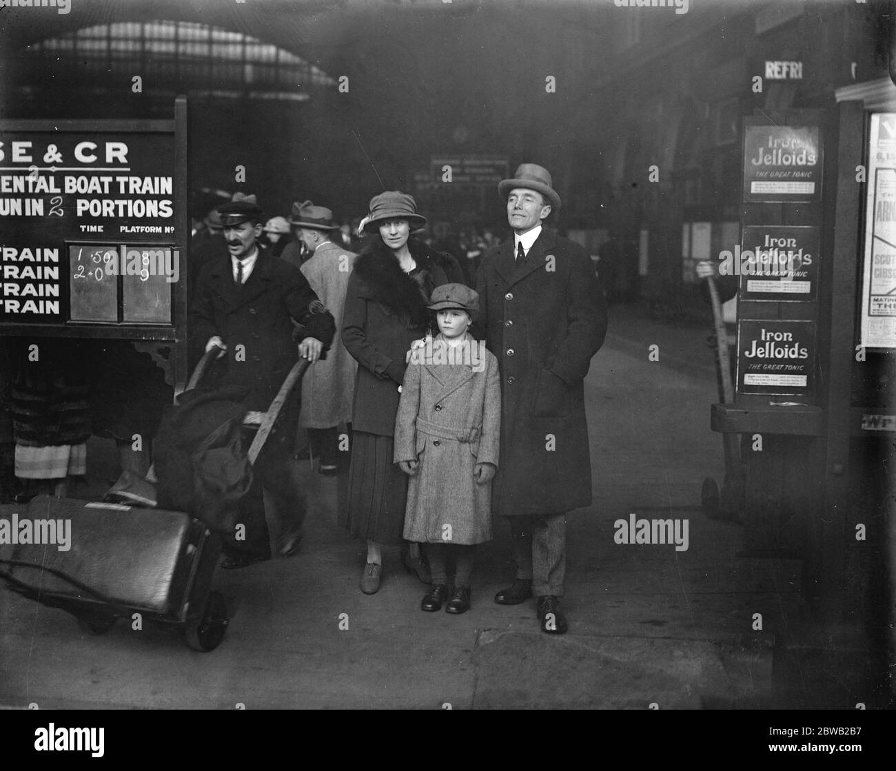 Taking up the RAF Command in India Air Vice Marshal P W Game C B , D S O , photographed at Victoria Station London , before his departure to take up the RAF command in India . His wife and son were present to see him off 7 December 1922 Stock Photo