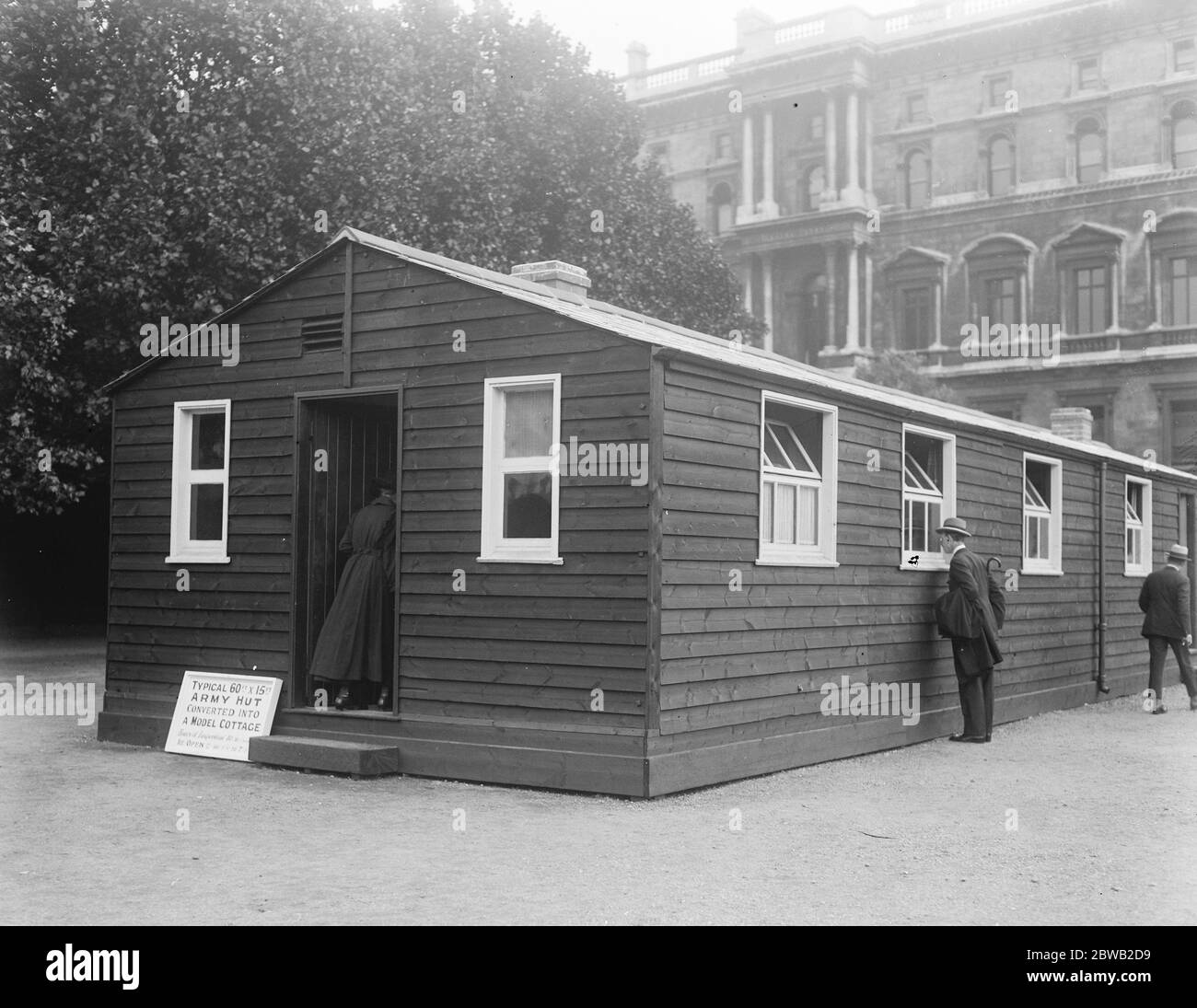 Army huts as new homes An army hut on the Horse Guards Parade converted into a comfortable home , by government as an example of its possibilities 23 July 1919 sign reads  Typical 60ft x 15ft Army Hut converted into a model cottage Stock Photo