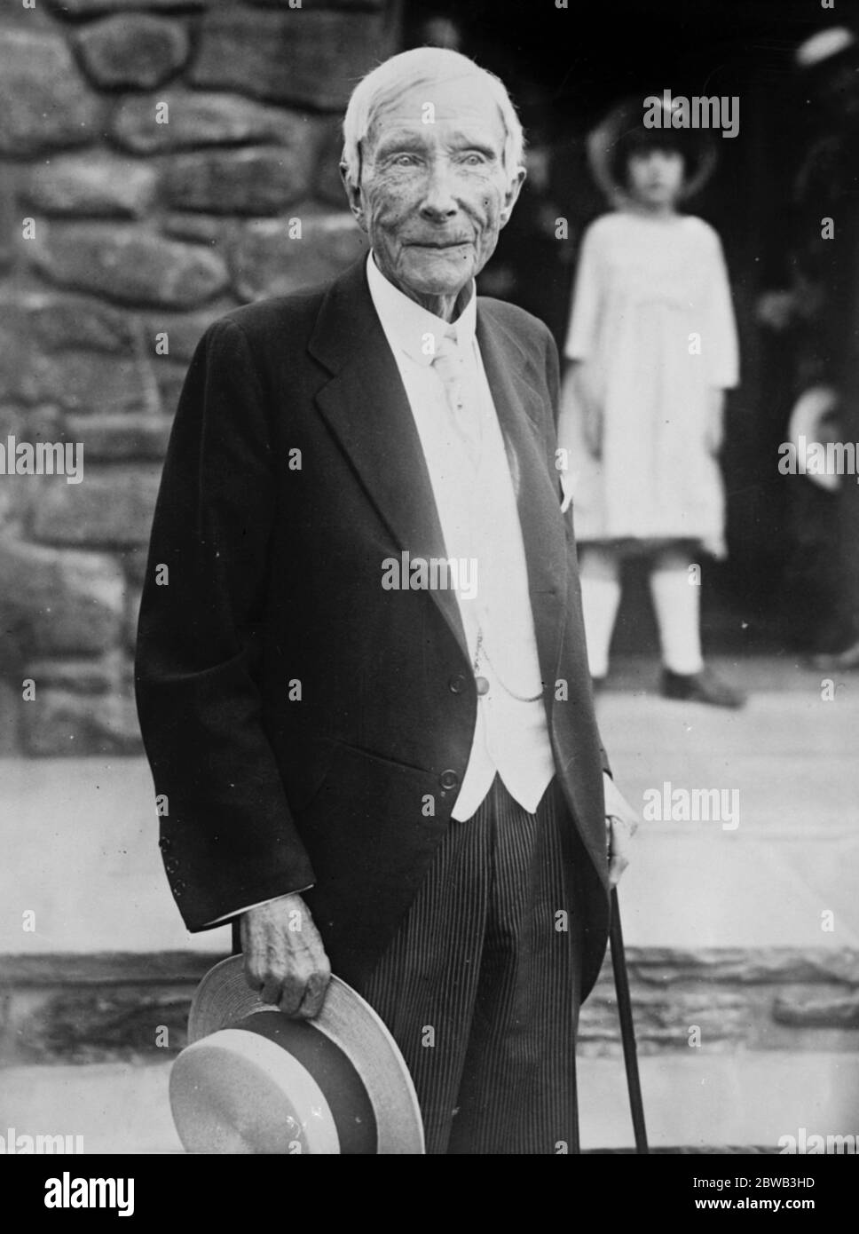 John Davison Rockefeller, full-length portrait, standing, facing right]