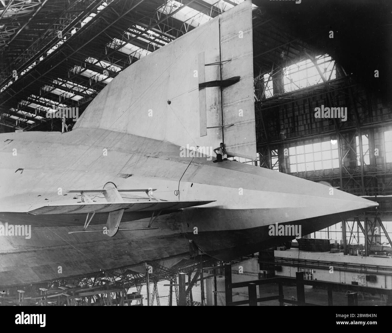 Great American airship about to make its trial flight . The great American airship ZR1 , which has been completed at Lakehurst , New Jersey , is expected to make its trial flight this weekend . The huge rudder of the airship . 30 August 1923 Stock Photo