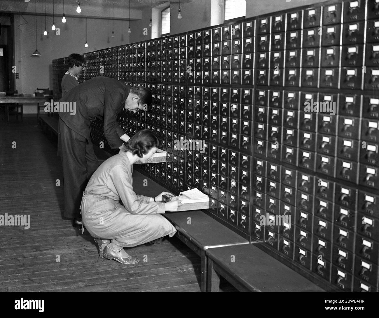 At the National Central Library , Malet Place , London , filing clerks get to work . 28 October 1933 Stock Photo