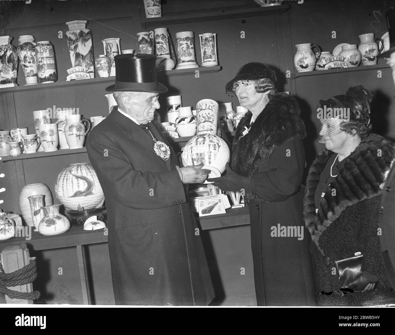 At the British Industries Fair at Olympia the Lord Mayor , Sir Percy Vince and Lady Vincent , admiring some Bretby Ware 21 February 1934 Stock Photo