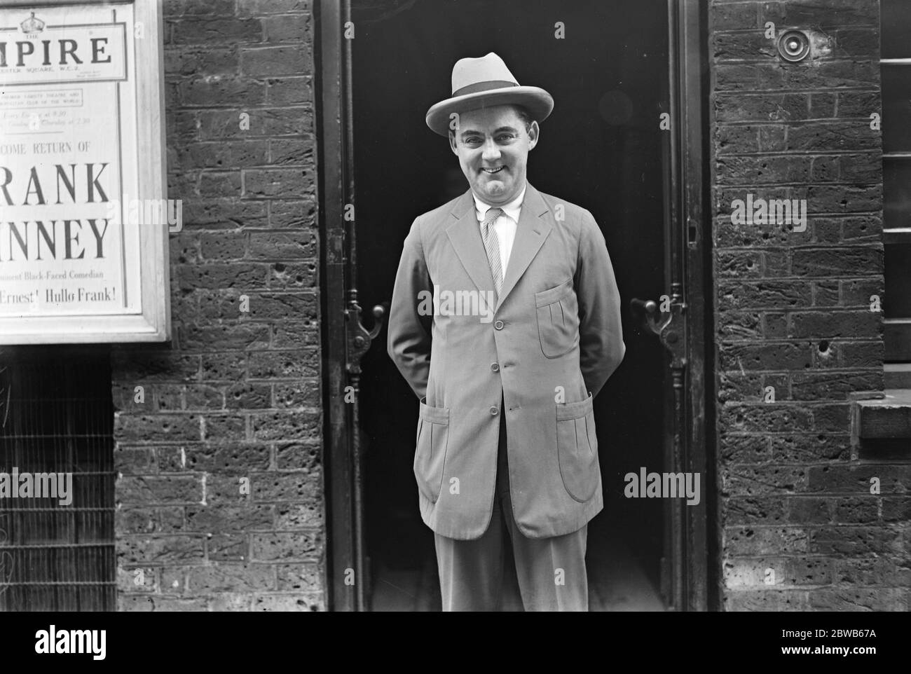 Frank Tinney , the famous American black - faced comedian , who is appearing , after an absence of 10 years , at the Empire Theatre , Leicester Square , where this photograph was taken . 25 August 1924 Stock Photo