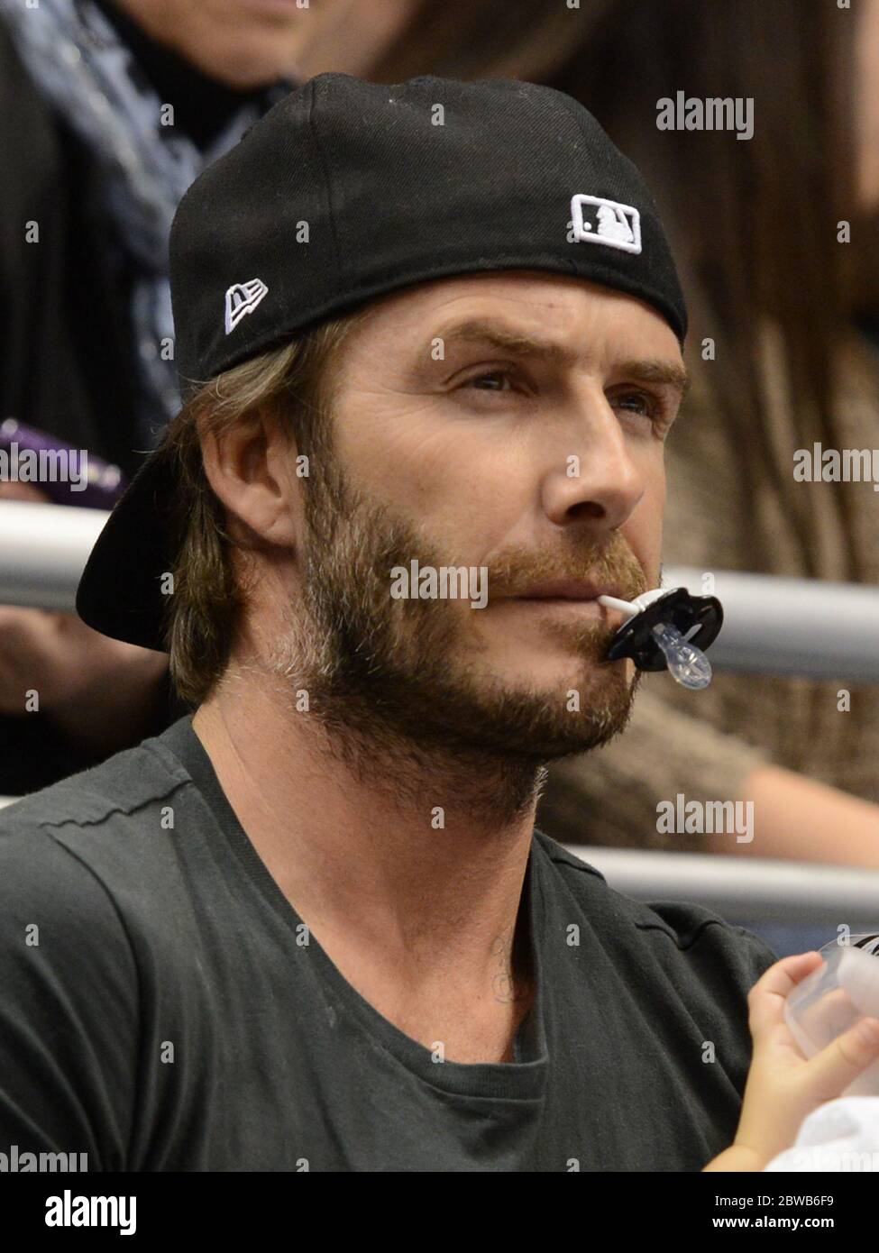 david beckham smoking cigarettes 21 October 2013 David Beckham and daughter Harper watch the Los Angeles  Kings ice hockey team play Calgary Flames at the Staples Center, Los  Angeles, CA and was joined by Brooklyn and