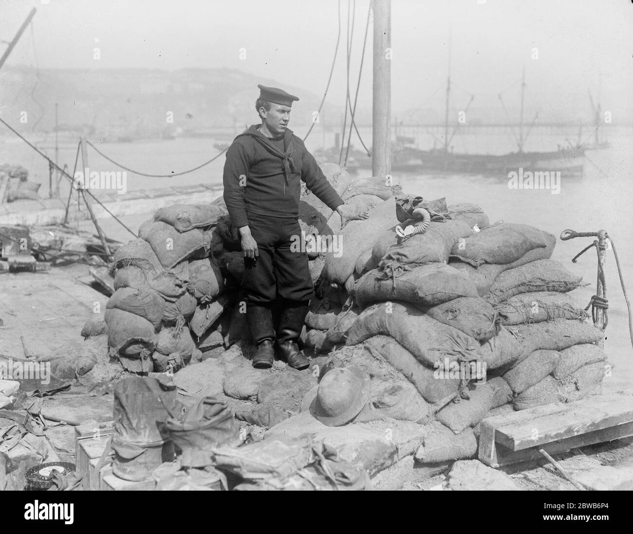 The Great Naval raid on Zeebrugge . A crewman in a sandbagged position aboard HMS Vindictive , a British protected cruiser . On 23 April , 1918 she was in a fierce action at Zeebrugge when she went alongside the Mole and her upperworks were badly damaged . 1918 Stock Photo